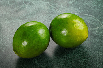 Two ripe green exotic avocado fruit