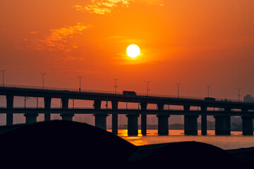 seaside sunset and railway infrastructure