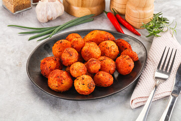 Baked young potato with paprika