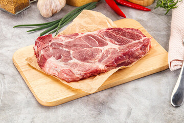 Raw pork neck steak for grill