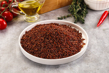 Red raw dry rice gor cooking