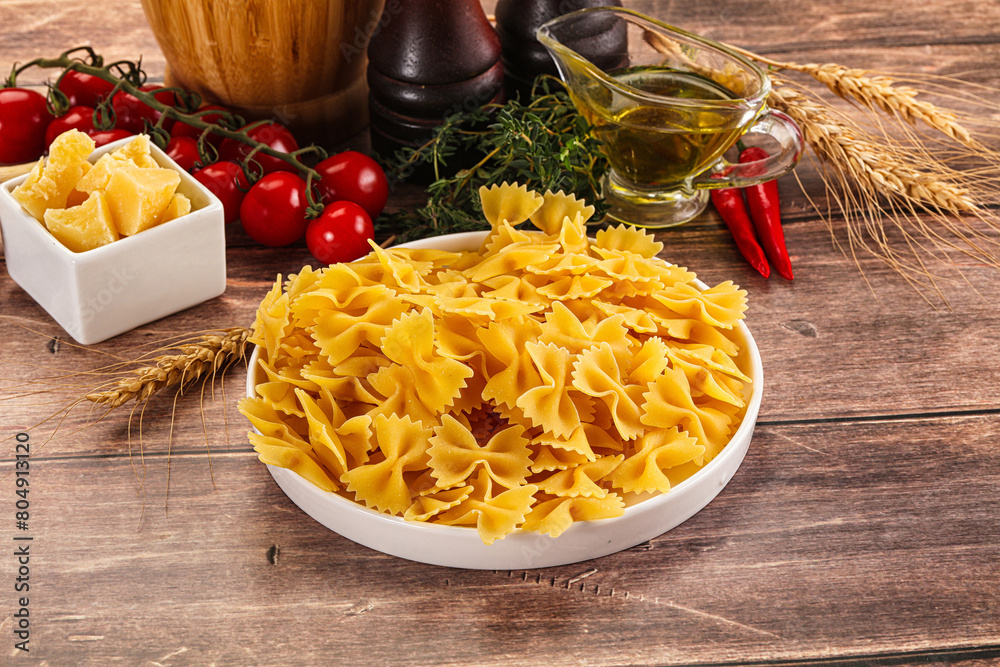 Sticker Raw dry Italian pasta - farfalle