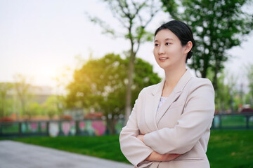 Confident Businesswoman Ready for Success at Sunset