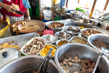Asian noodles with stewed and braised duck in many brown soup