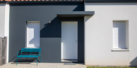 modern facade house grey and white door of new suburban home