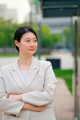 Confident Asian Businesswoman in Urban Setting
