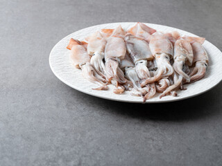 baby squid on a plate	