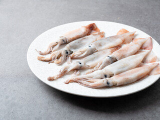 baby squid on a plate	