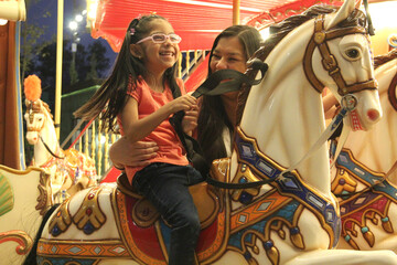 Divorced single mom and 5 year old brunette Latina daughter spend fun time on amusement park...