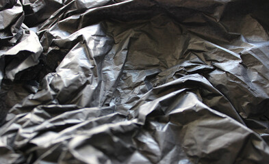 Black Wrapped Paper After Use Close Up View. Paper Texture Stock Photo

