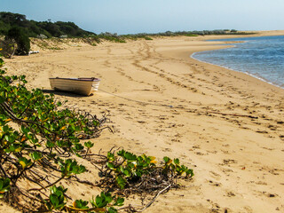 A small rowboat moored on the beach of a small sheltered bay in Portuguese Island, part of the...