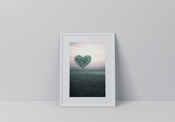 Tree in the shape of heart love with green grass field over cityscape at sunset poster in vertical white frame on floor over grey wall, Valentines day concept, 3D rendering