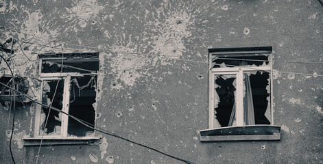 destroyed and burned houses in the city during the war in Ukraine