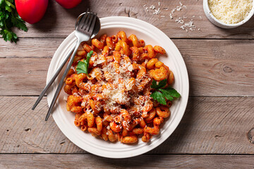 Cavatappi pasta with tomato sauce and parmesan cheese