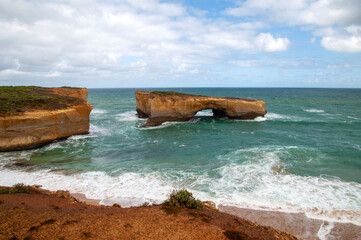 Port Campbell Australia, view of London bridge a natural limestone arch. 