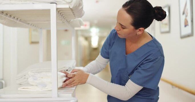 Nurse, inventory and woman in hospital for check stock, towels and diapers on shelf. Checklist, professional and female caregiver for counting, product and medical supplies in retirement home