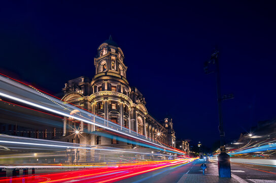 London, United Kingdom - April 29, 2024: Raffles London hotel,  the Old War Office,  Whitehall Road. Twilight, Light trails.
