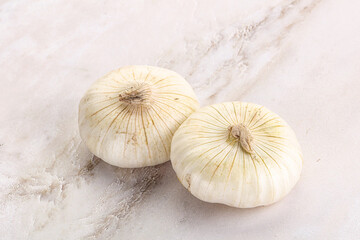 Raw white onion heap isolated