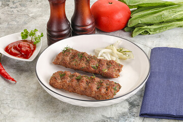 Kebab with beef served onion
