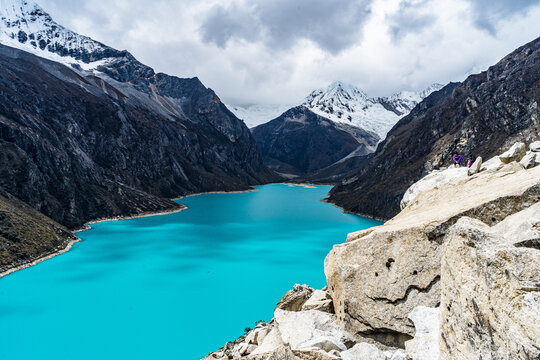 panormaic view of laguna paron in the snow-covered andes in the Huascar&aacute;n national park in peru