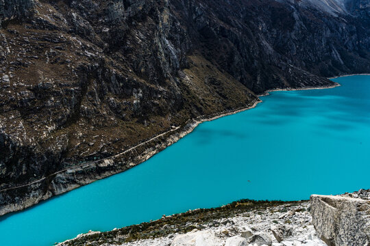 panormaic view of laguna paron in the snow-covered andes in the Huascar&aacute;n national park in peru