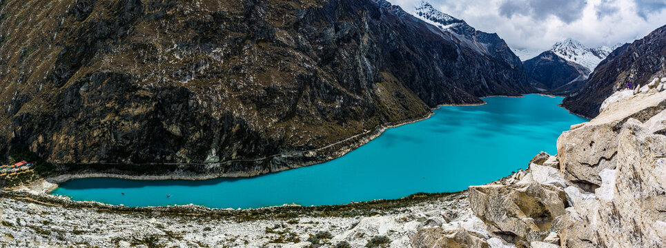 panormaic view of laguna paron in the snow-covered andes in the Huascar&aacute;n national park in peru