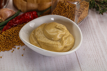Dijon mustard sauce in the bowl
