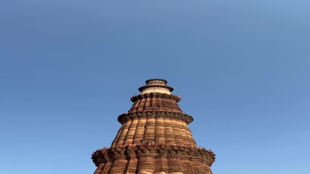 The Qutub Minar at Delhi India.Tallest minaret in the world closeup with selective focus and blur
