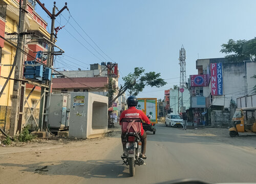 zomato boy delivering food in city ,online food booking concepts,digital india