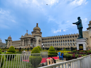 the Vidhana Soudha stands as a beacon of governance, its white grandeur and golden finials...
