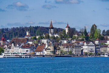 Scenic view of Swiss City of Lucerne seen from passenger ship on Lake Lucerne on a sunny spring noon. Photo taken April 11th, 2024, Lucerne, Switzerland.