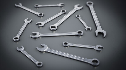 Set of wrenches standing on gray background. 3D illustration