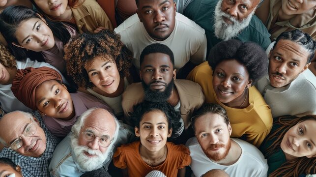 From directly above multi ethnic large group of people looking at camera hyper realistic 