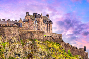Castle hill in Edinburgh with green grass during sunrise, Scotland, UK