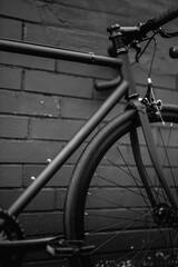 Black bicycle on the street. Transportation background
