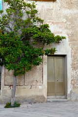 Fototapeta premium Ancient buildings in the historic center of Patù Italy