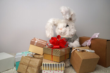 Boxes with gifts, set of boxes, toy baby rabbit.