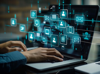 Fototapeta premium Digital documents and funky blue icons on the screen, a business man working with a laptop computer at the office. A virtual abstract background of a digital document management system for catering da