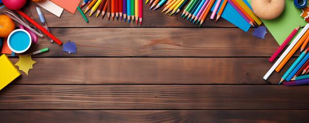 Flat Lay School Stationery On A Wooden Background
