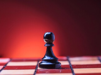 Chess piece, pawn or peon on chessboard
