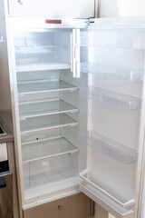Empty Refrigerator at Home in Switzerland.