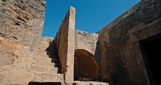Immerse Yourself in History: Discovering the Ancient Greek Tombs and Necropolises at the Tomb of the King in Paphos, Cyprus. High quality 4k footage
