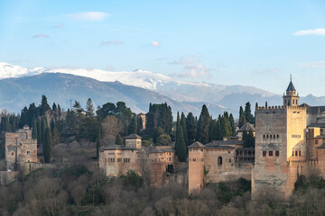 High level panoramic sunset view over the Alhambra palace with Islamic and Spanish architecture in...