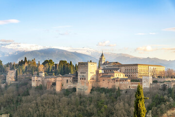 High level panoramic sunset view over the Alhambra palace with Islamic and Spanish architecture in...