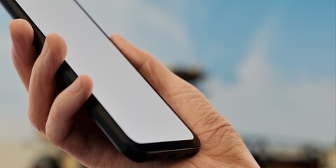 Hand with smartphone in wheat field, perfect for agricultural tech promotions