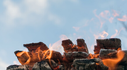 View of a campfire made of stacked logs