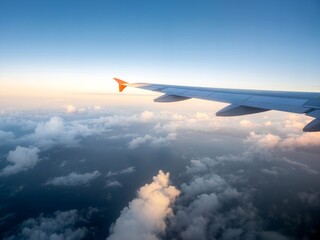 From the perspective of the high altitude aircraft's porthole, we can see the wings and clouds