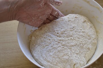 kneading dough in the bowl