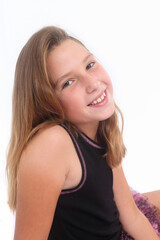 Fototapeta premium studio portrait of a cheerful preteen girl