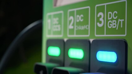 Chisinau, Moldova - April 18, 2024: Close-up of a green, BYD electric car charging station